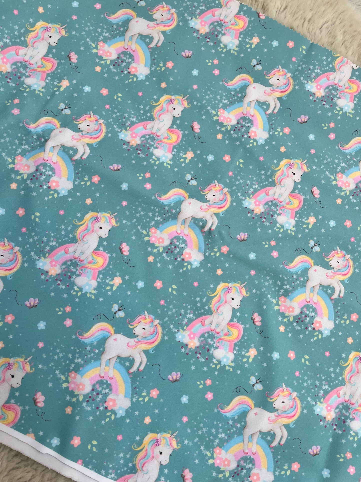 Reststück Einhorn türkis Softshell ca.48cm