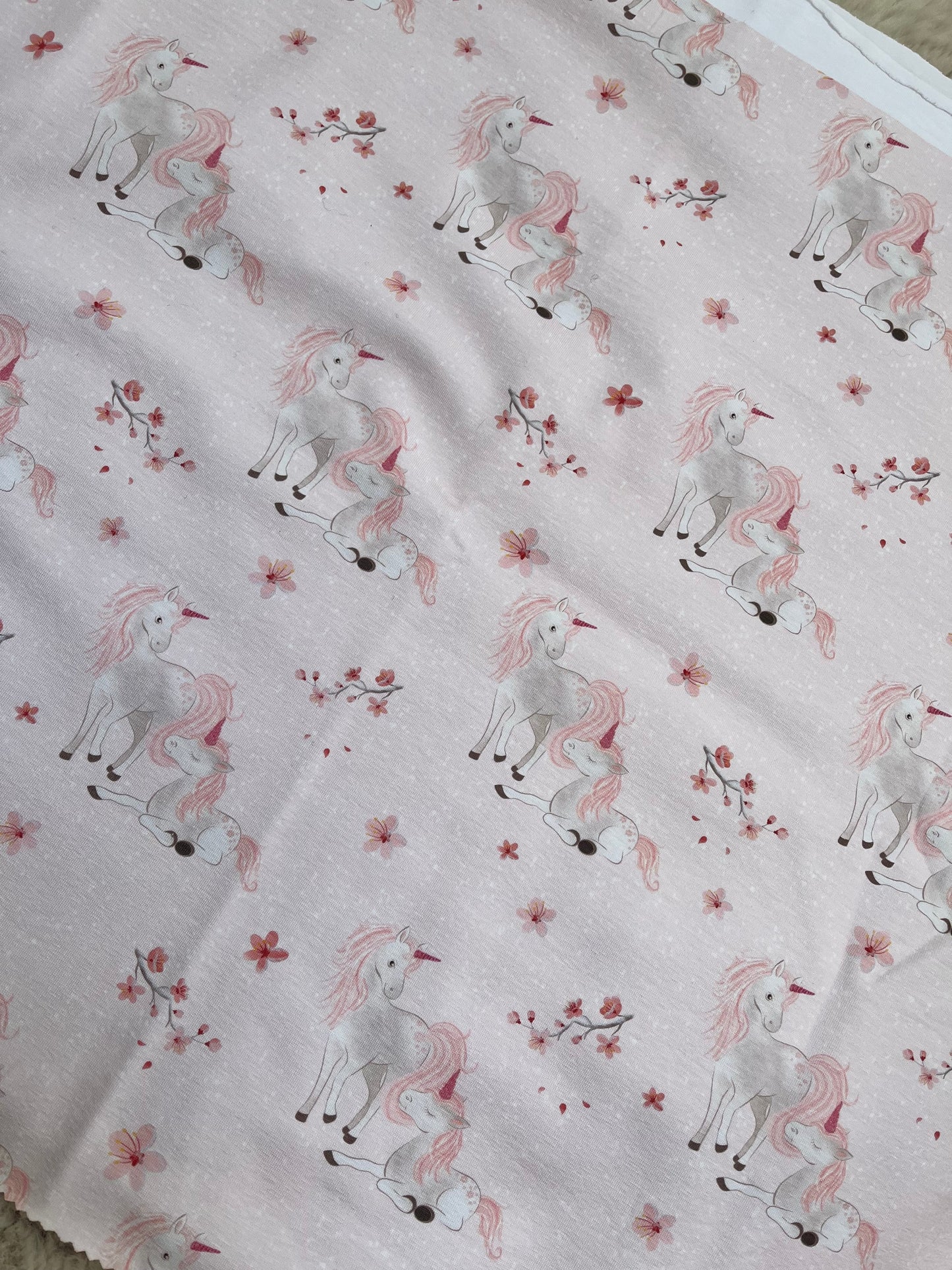 Reststück Einhörner Sakura hell Jersey ca. 49cm